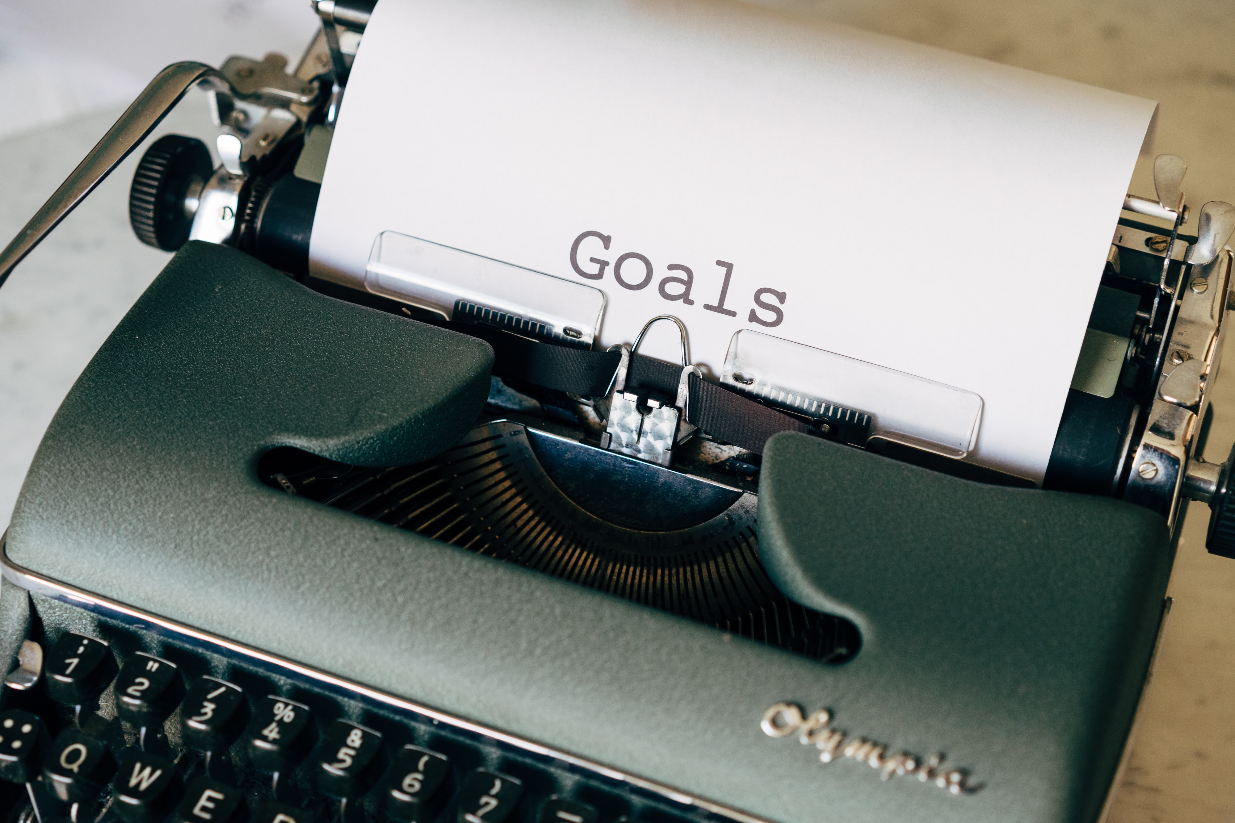 black and white typewriter on green textile.jpg